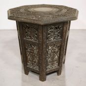 An Anglo-Indian carved hardwood octagonal occasional table, width 46 cm.