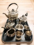 An EPNS kettle on burner stand, a further three piece tea service and other plated items.