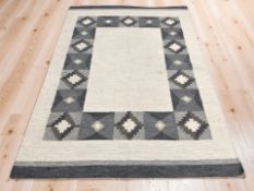 A flatweave kilim,