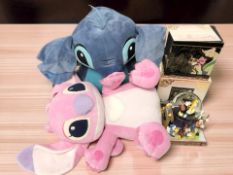 A group of Disney soft toys and other ornaments.