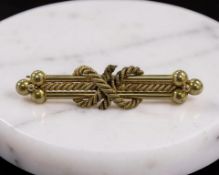 A Victorian gold rope twist bar brooch, stamped 15c, width 4.