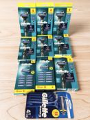 Ten various packs of Gillette razors and blades.