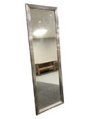 A vintage silvered mirror, 170 cm x 57 cm.