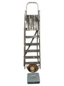 A vintage wooden step ladder, a copper and brass twin handled cooking pot, metal cash box, etc.