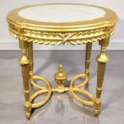 A reproduction Harrington & Gil gilt oval centre table with white marble inset top, width 87 cm.