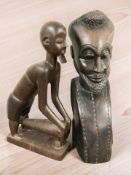 Two African carved hardwood statues, height 53 cm.