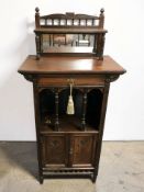 A Victorian mahogany mirrored back side cabinet, width 61 cm.