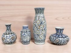 Four Iznik-style pottery vases, tallest 30.5 cm.