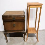 An oak jardiniere stand and a mid-century bur walnut bedside cabinet.
