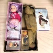 A vintage jointed mohair teddy bear, Barbie doll in box, and other toys.
