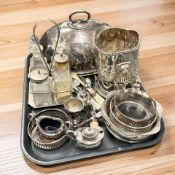 EPNS wares including a dome cover, bottle stand with lion mask handles, bottle coaster, a cruet,