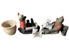 A group of concrete garden statues and planters, tallest 48 cm.