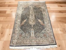 An Indian tree of life rug, 229 cm x 145 cm.