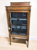 An Edwardian mahogany and satinwood inlaid display cabinet, 61 cm x 33 cm x 128 cm.