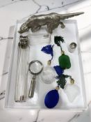 A group of dressing table jars including two silver mounted examples, further perfume bottles,