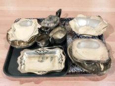 An EPNS three piece tea service, various swing handled baskets, etc.
