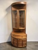 A Nathan teak corner cabinet.