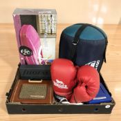 A vintage style radio, a Barbie movie star convertible toy in box, punch bag and gloves, etc.