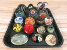 A group of art glass paperweights.