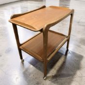 A 20th century teak two tier trolley, length 73 cm.