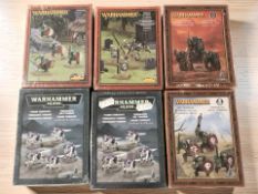 Six Games Workshop Warhammer 40K figurine sets, all sealed in retail cellophane.