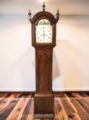 An early 19th century mahogany eight day long case clock,