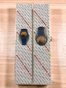 Two lady's and gent's Swatch wristwatches 'Newcastle Brown Ale', both boxed.