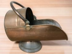 A Victorian copper coal receiver.