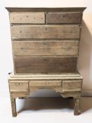 An 18th century oak chest on stand, 108 cm x 65 cm x 160 cm,