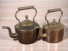 Two Victorian copper kettles, tallest 28 cm.