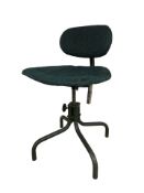 A mid-century enameled metal Tan-Sad chair.