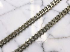 A heavy-gauge silver Cuban-style chain necklace, stamped 925, length 88cm.