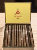 Twenty three Monte Cristo Cuban Habana cigars.