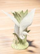 A Fitz & Floyd porcelain vase surmounted by a Heron, circa 1986, height 26 cm.