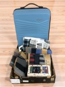 An American Tourister luggage case and several new packs of socks, pyjamas, etc, including Fatface.