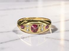 An 18ct gold ruby and diamond ring,