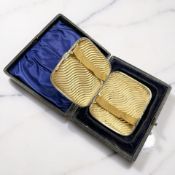 A silver cigarette case, Birmingham 1900, length 8.5cm, in fitted case.