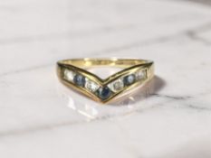 A 9ct gold sapphire wishbone dress ring, size K CONDITION REPORT: 1.