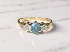A 9ct gold diamond and blue stone dress ring, size P CONDITION REPORT: 1.