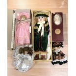 A group of collector's dolls.