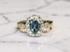 A 9ct gold diamond and blue stone dress ring,