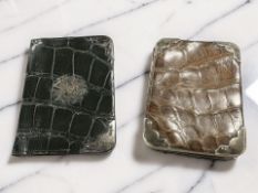 Two antique silver-mounted leather purses,