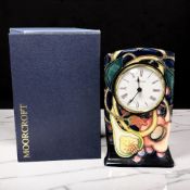 A modern Moorcroft Queen's Choice quartz mantel timepiece designed by Emma Bossons, height 16 cm,