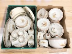 A large quantity of Villeroy & Boch tea and dinner wares decorated with woodland animals.