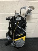 A Wilson golf bag containing Tech Edge clubs.