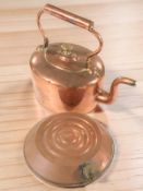 A Victorian copper kettle and a canteen.