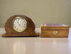 An Edwardian 8-Day Mantel Clock with a French movement, in an inlaid mahogany case,