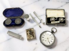 A group of silver propelling pencils, vesta case, a silver pocket watch, two pairs of cuff links,