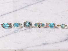 Six blue gemstone dress rings