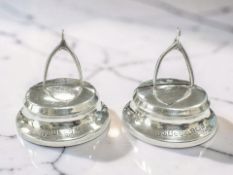 A pair of loaded-silver menu stands surmounted by wishbones, Birmingham 1928,